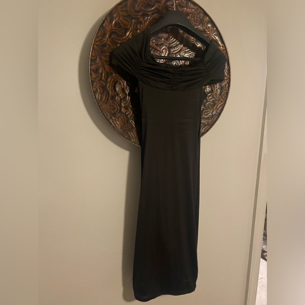 Black off shoulder midi cocktail dress. Never worn.